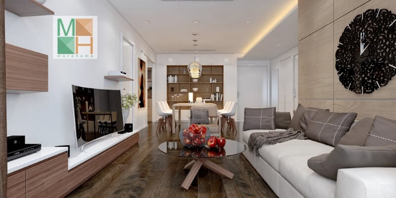 Thiết kế nội thất phòng khách chung cư đẹp với kệ ti vi treo tường kết hợp bộ sofa màu trắng với gối tựa màu ghi tạo điểm nhấn nổi bật cho căn phòng Thiết kế chung cư